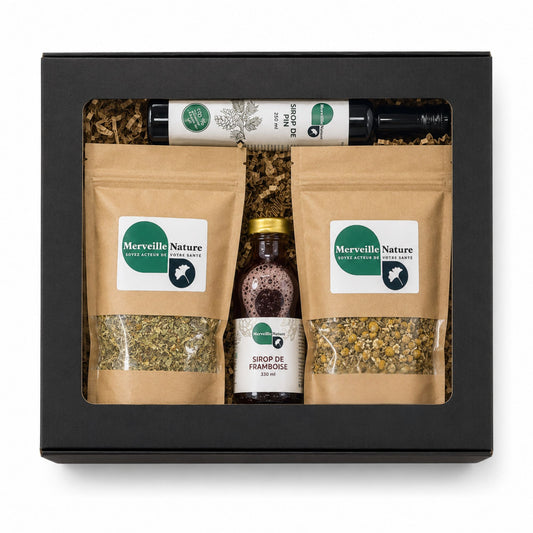 Coffret cadeau MerveilleNature avec sachets de tisanes, sirop de framboise et sirop de pin, présenté dans une boîte noire sur fond blanc.