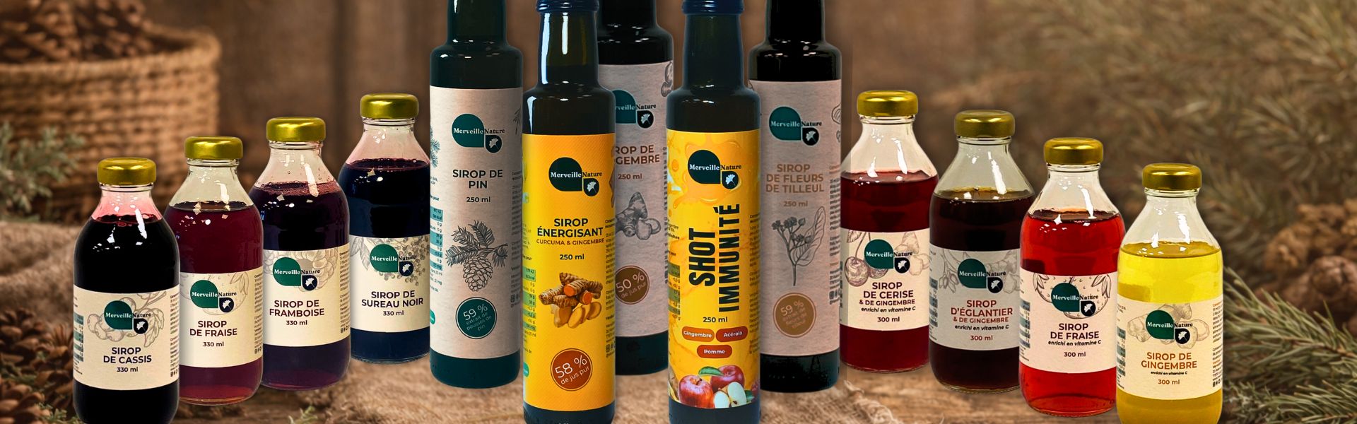 Assortiment de sirops bien-être, sirops traditionnels, shots naturels et jus artisanaux à base de plantes, présenté sur une table en bois dans une ambiance chaleureuse et naturelle.