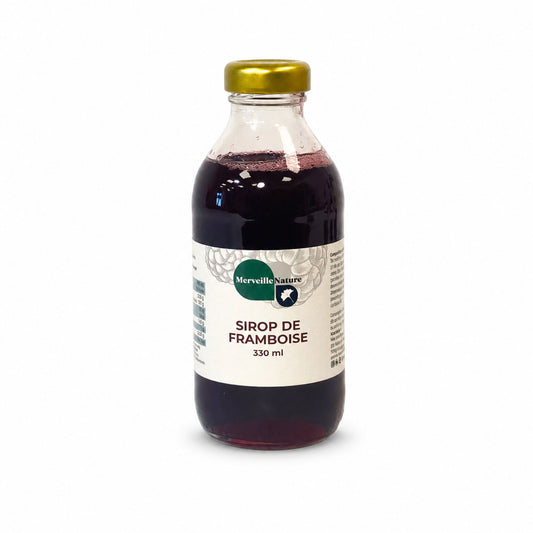 Bouteille de sirop de framboise Merveille Nature 330 ml sur fond blanc, sirop artisanal fruité pour boissons et desserts.