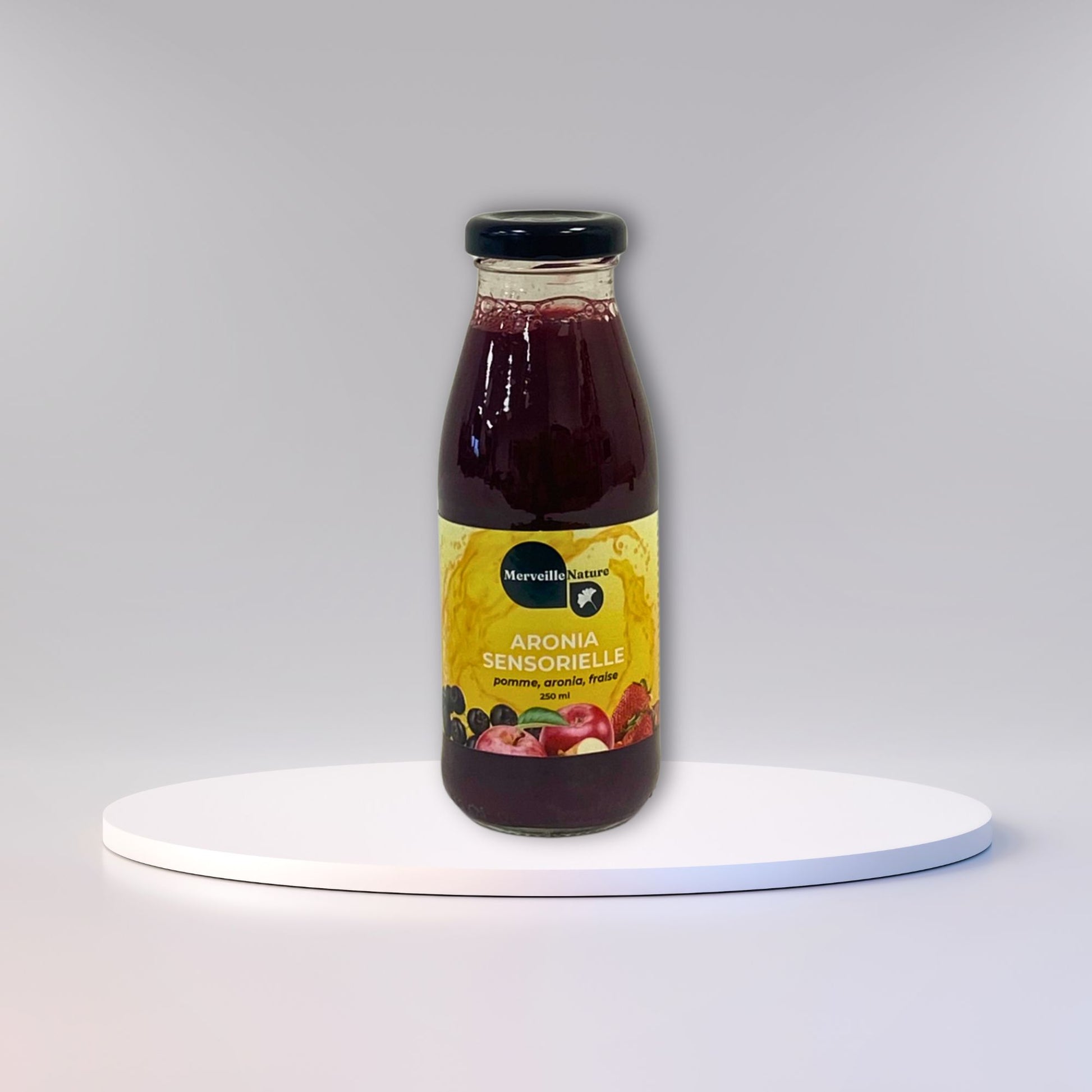 présentation de la bouteille de jus d'aronia sensorielle de MerveilleNature